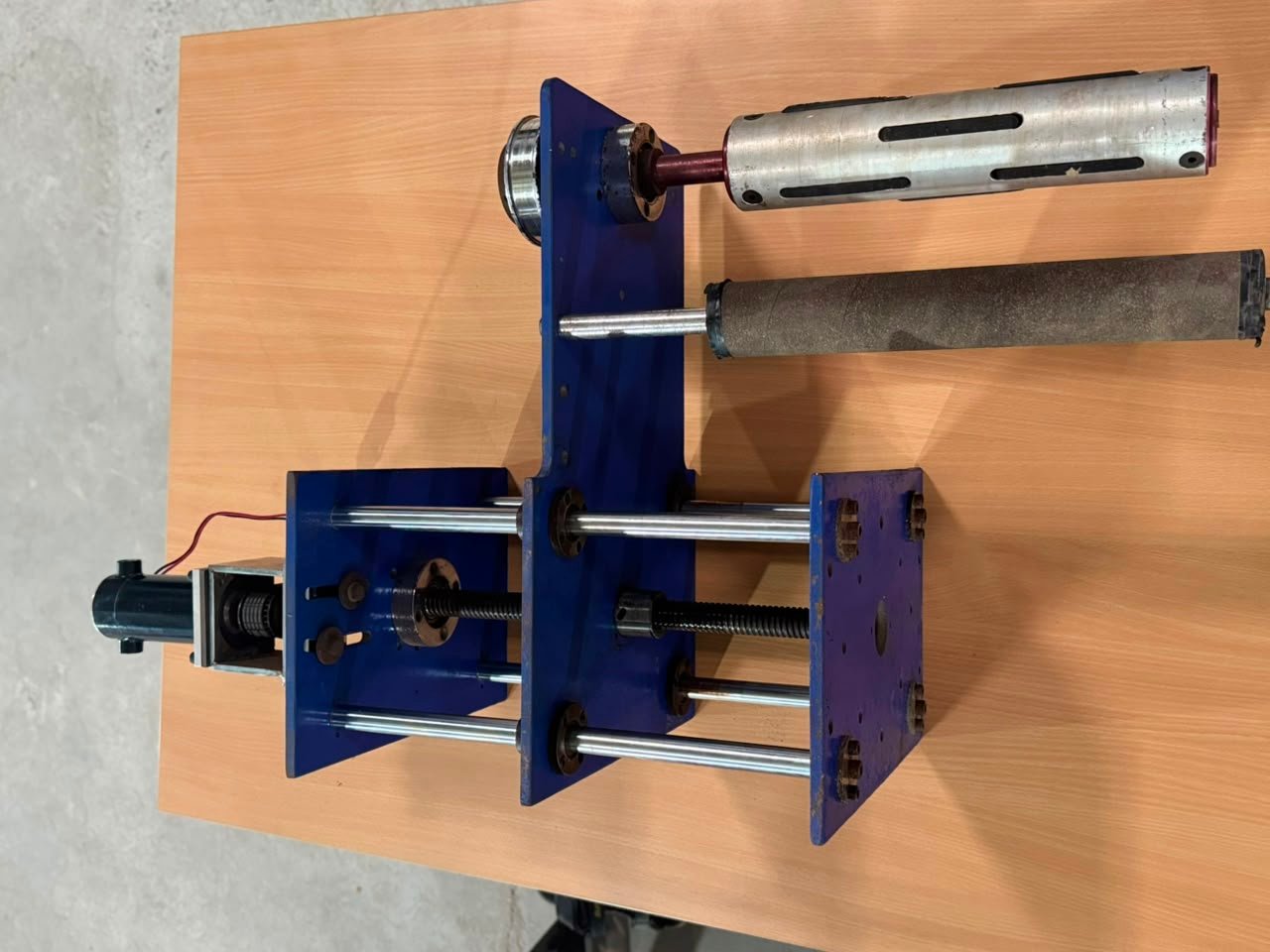 PROASP spool-winding rig with edge-guide assembly and winding shafts