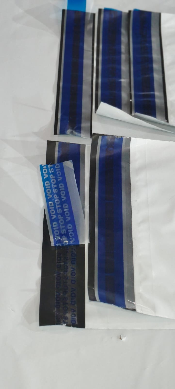 Dry-Peel VOID Tamper-Evident Film and Labels