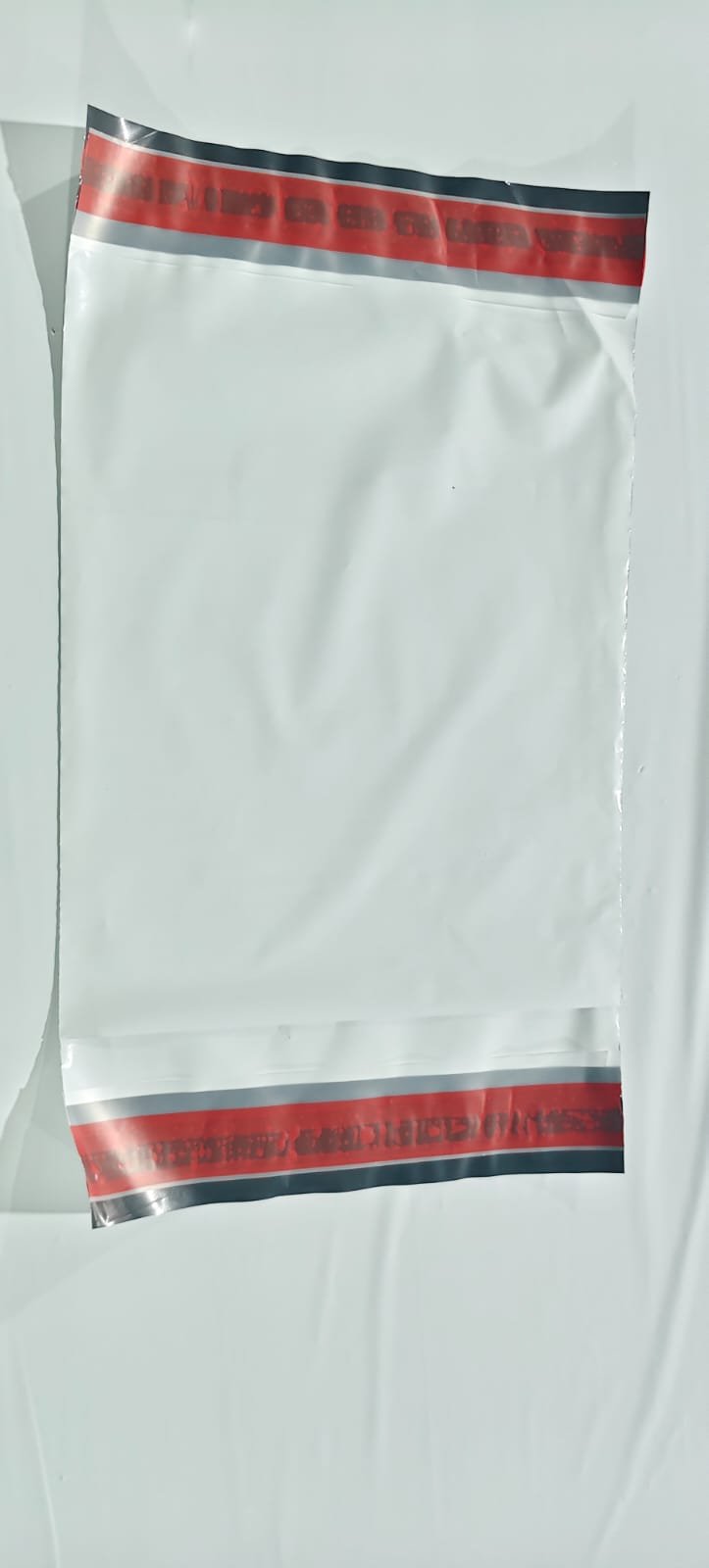 Tamper-Evident Release Film for Poly Mailers and Courier Packaging